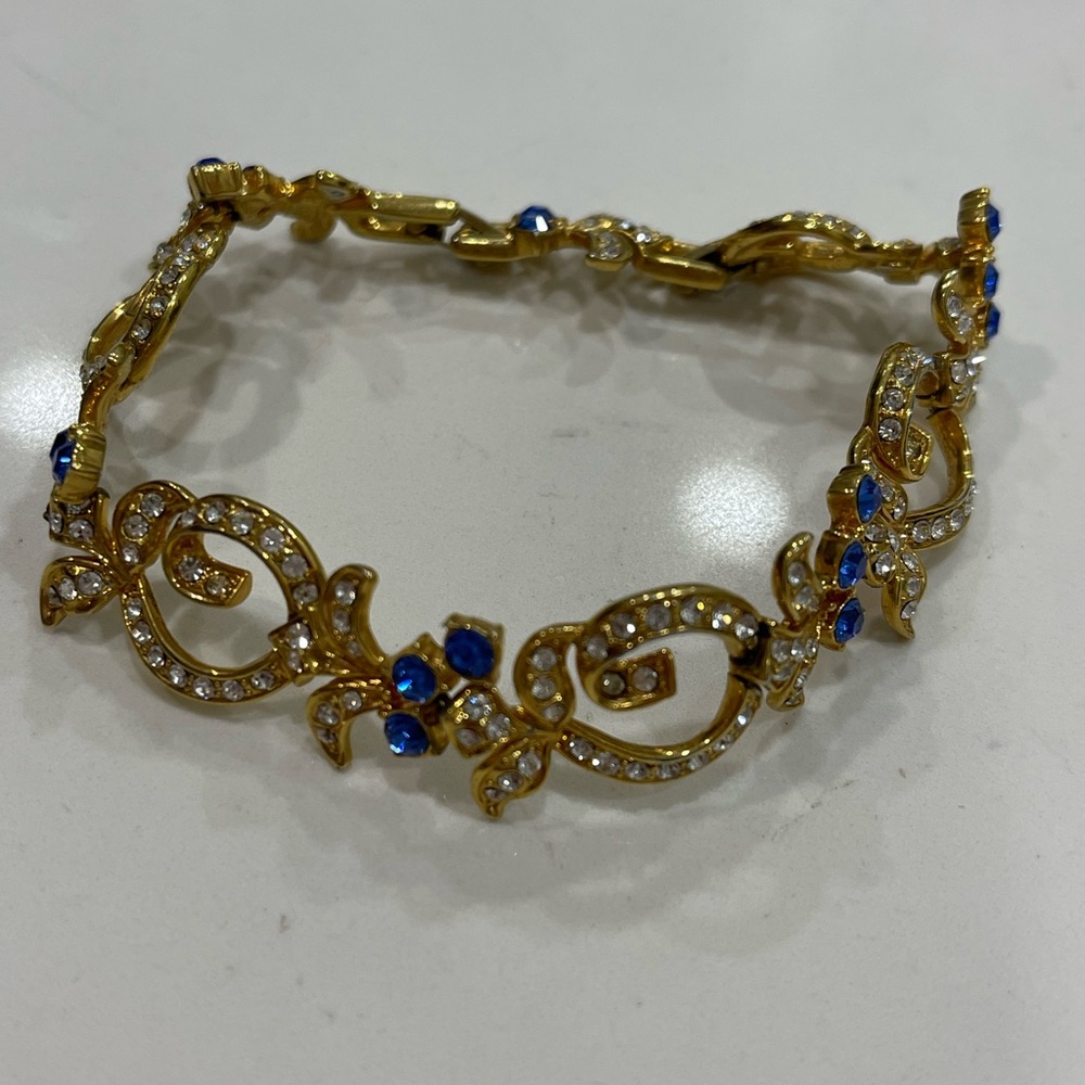 GOLD TONE W/ BLUE & CLEAR DIAMONDS